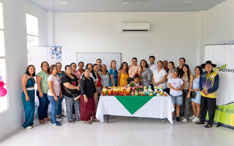 Community members taking part in a social project next to the handmade products